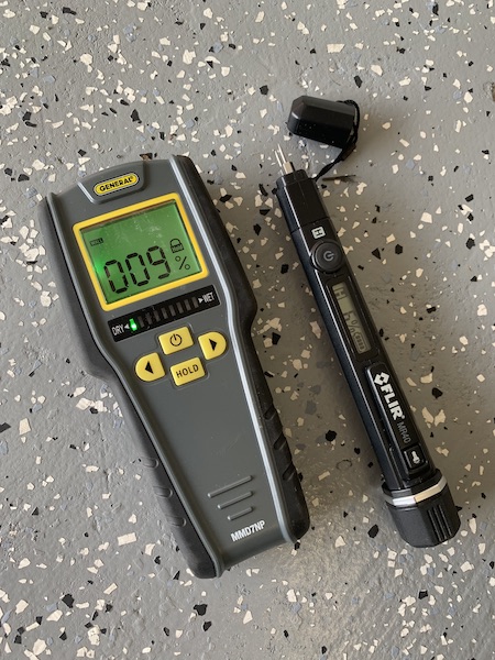 Non-contact and contact moisture meters used for inspecting for RV and motorhome water leaks